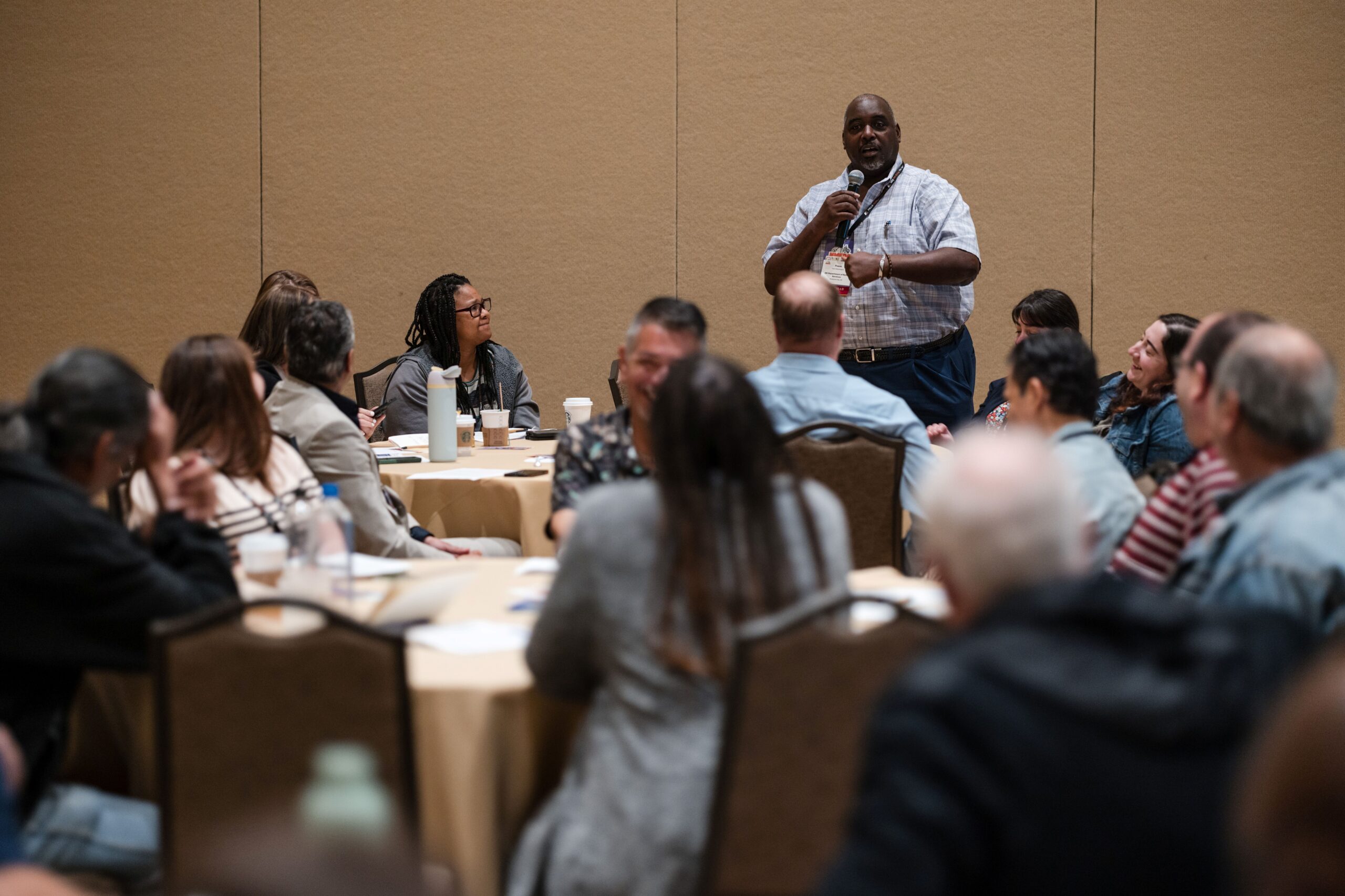 Speaker leading an education session